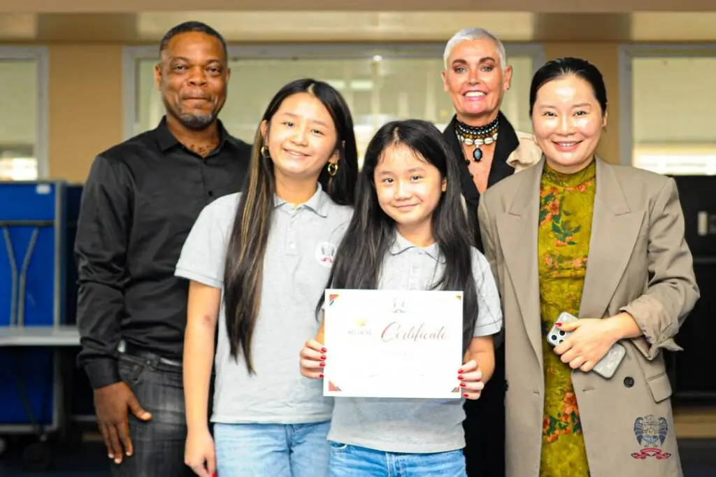 American School of Douala student receives recognition for outstanding achievement during the October Student of the Month ceremony.